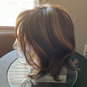 Raquel Welch partial mono, lace front, memory cap synthetic wig. Hardly used.
